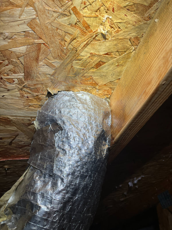 Cleaned wood around vent shaft with fixed insulation