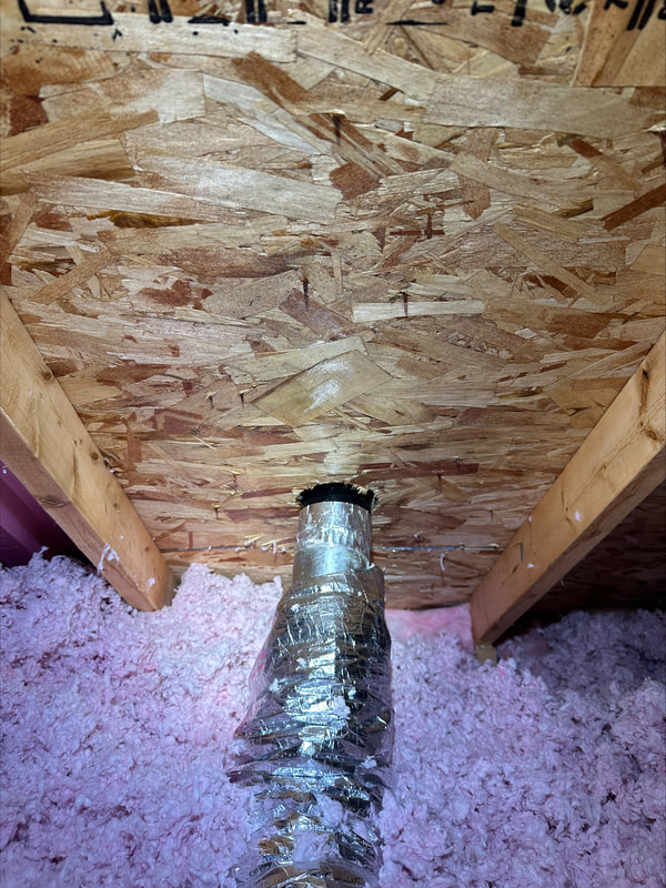 Cleaned wood surface of attic
